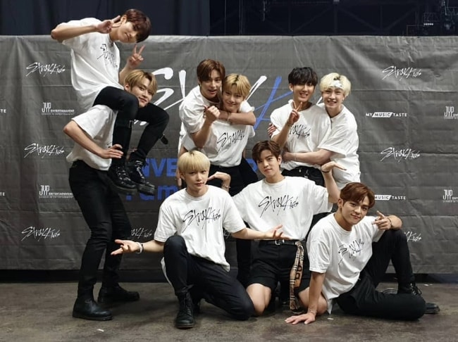 All the 'Stray Kids' members posing for the camera in August 2019
