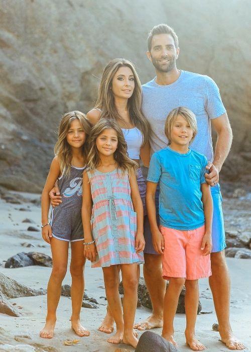 Ava Marie posing with her parents and siblings in California