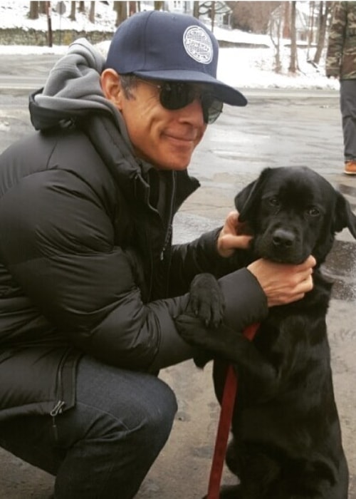 Ben Stiller with an arson detecting police dog named Daisy