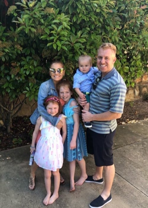 Brandi Redmond with her family in the past