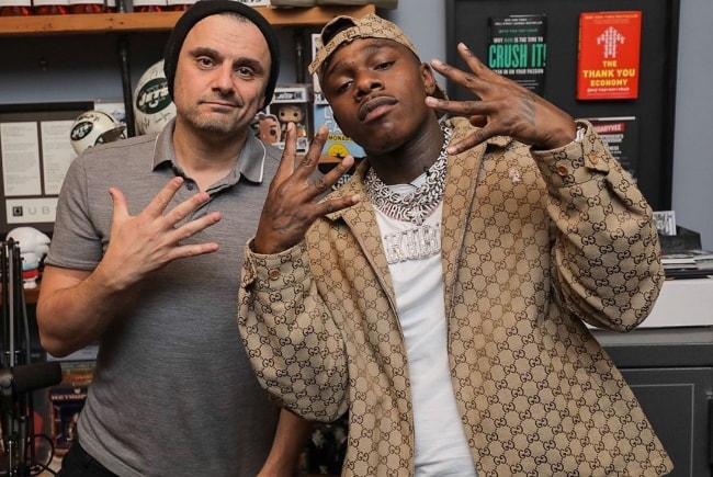 DaBaby as seen while posing for a picture alongside Gary Vaynerchuk at Times Square, New York City, New York, United States in October 2019