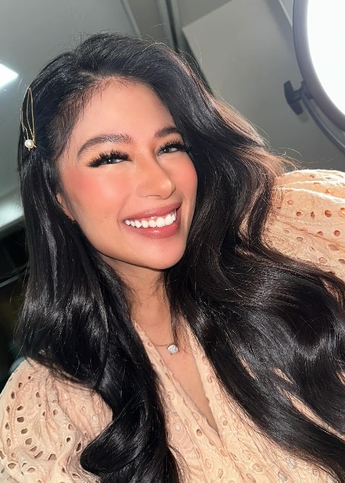 Gigi De Lana as seen while smiling in a selfie in December 2023