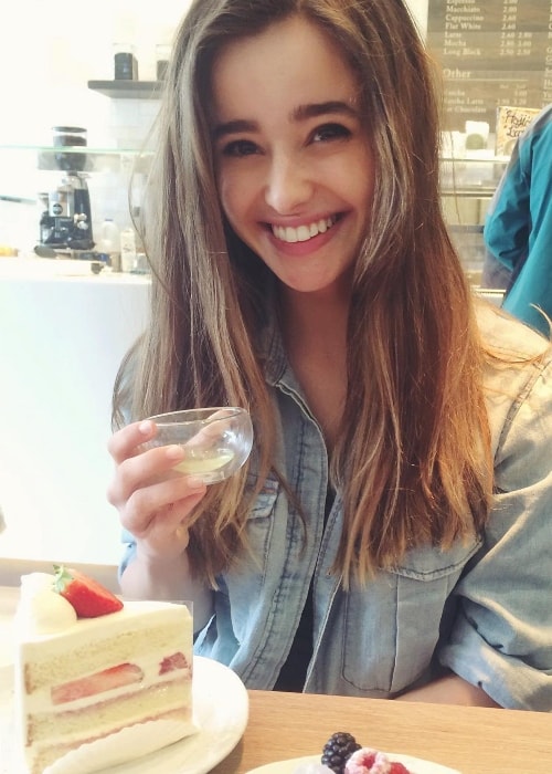 Holly Earl celebrating with cake after passing her driving test in April 2016