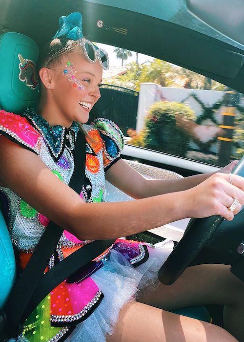 Jojo Siwa in action driving a car in August 2020