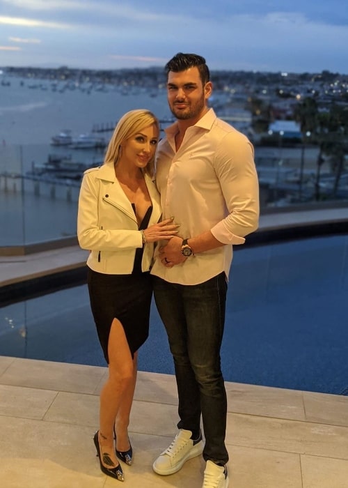 Mary Fitzgerald posing for a picture alongside Romain Bonnet in Orange County, California in February 2020