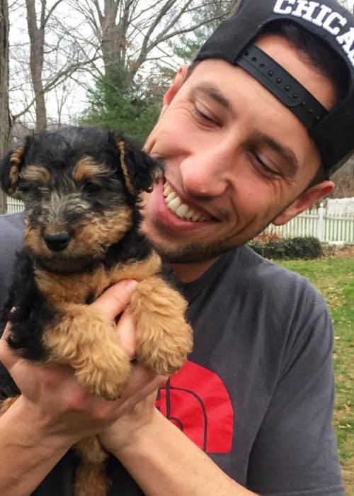 Mike Majlak in an Instagram post with his dog as seen in December 2015