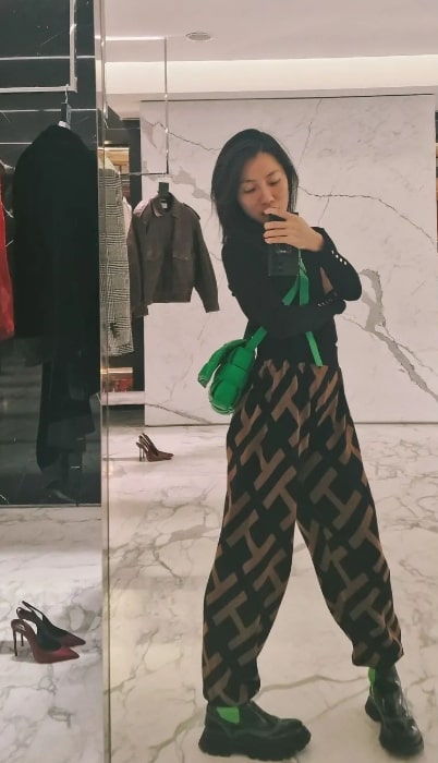 Nancy Xu as seen while taking a mirror selfie in London, England, United Kingdom in November 2023