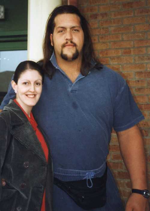 Paul Wight Takes Photographs With a Fan in Sheffield in England During a WWF Tour in April 1999